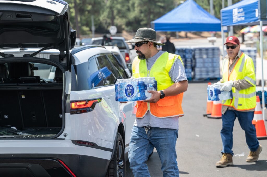 LADWP staff distributing water to affected residents